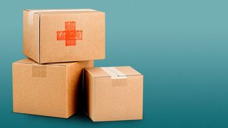 Illustration of moving boxes piled up with a red medical cross scribbled on the side of one box
